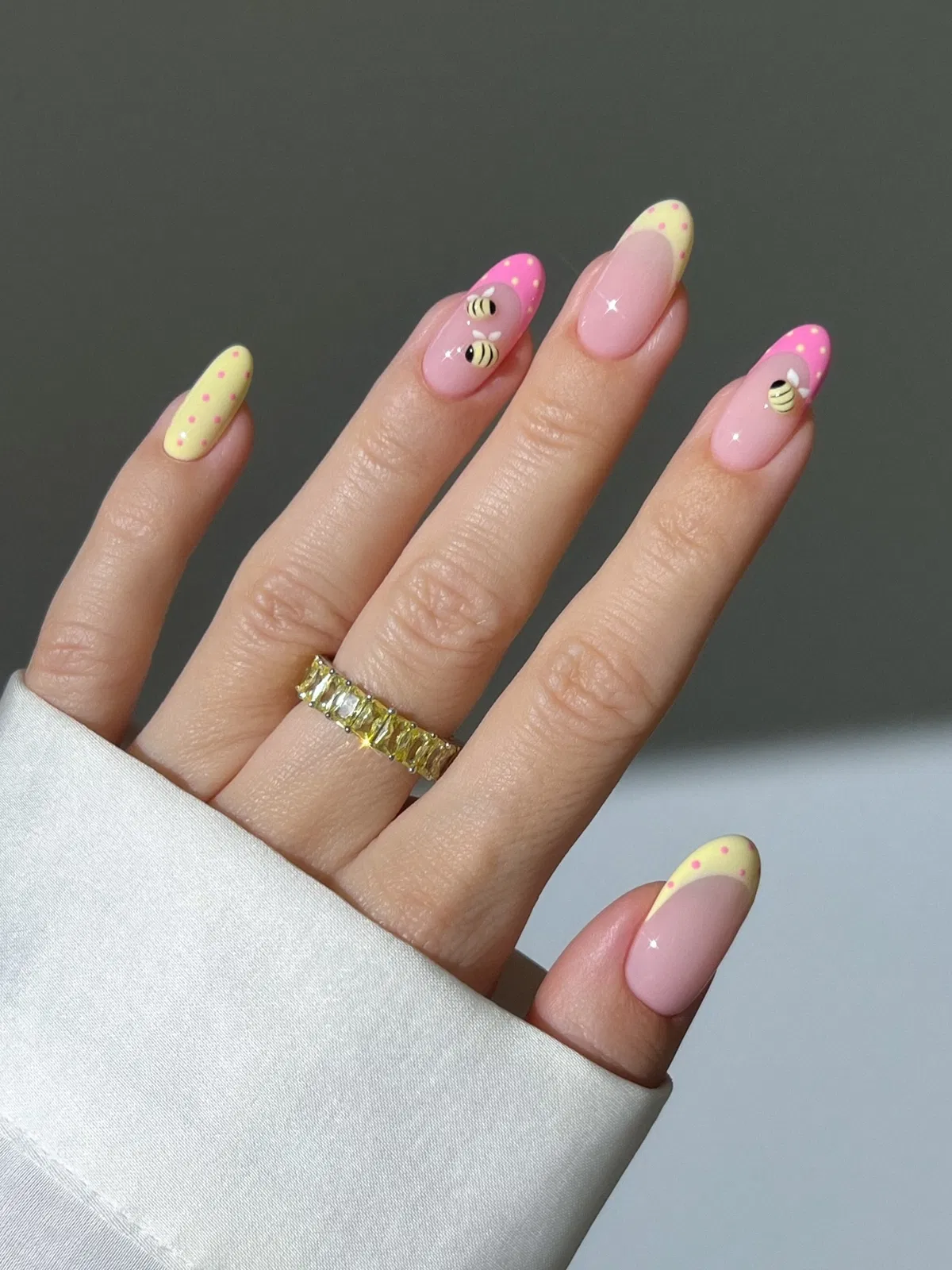 Pale yellow dotted tips with raised bee accents