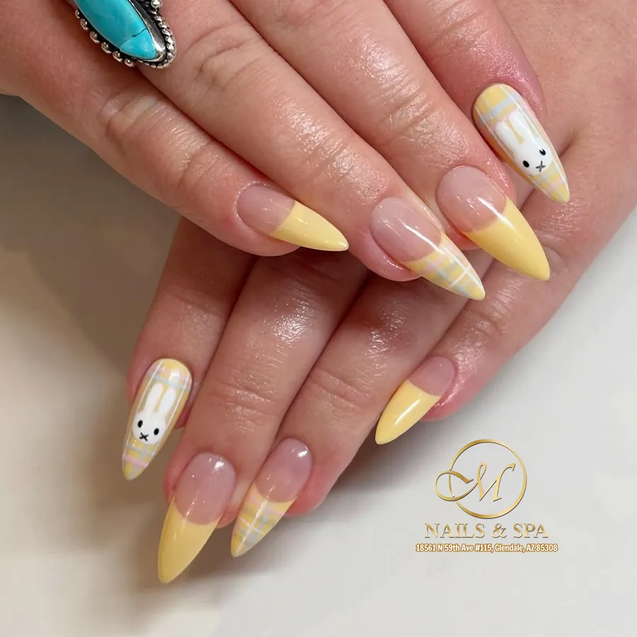 Pale yellow plaid French tips with bunny-face accents