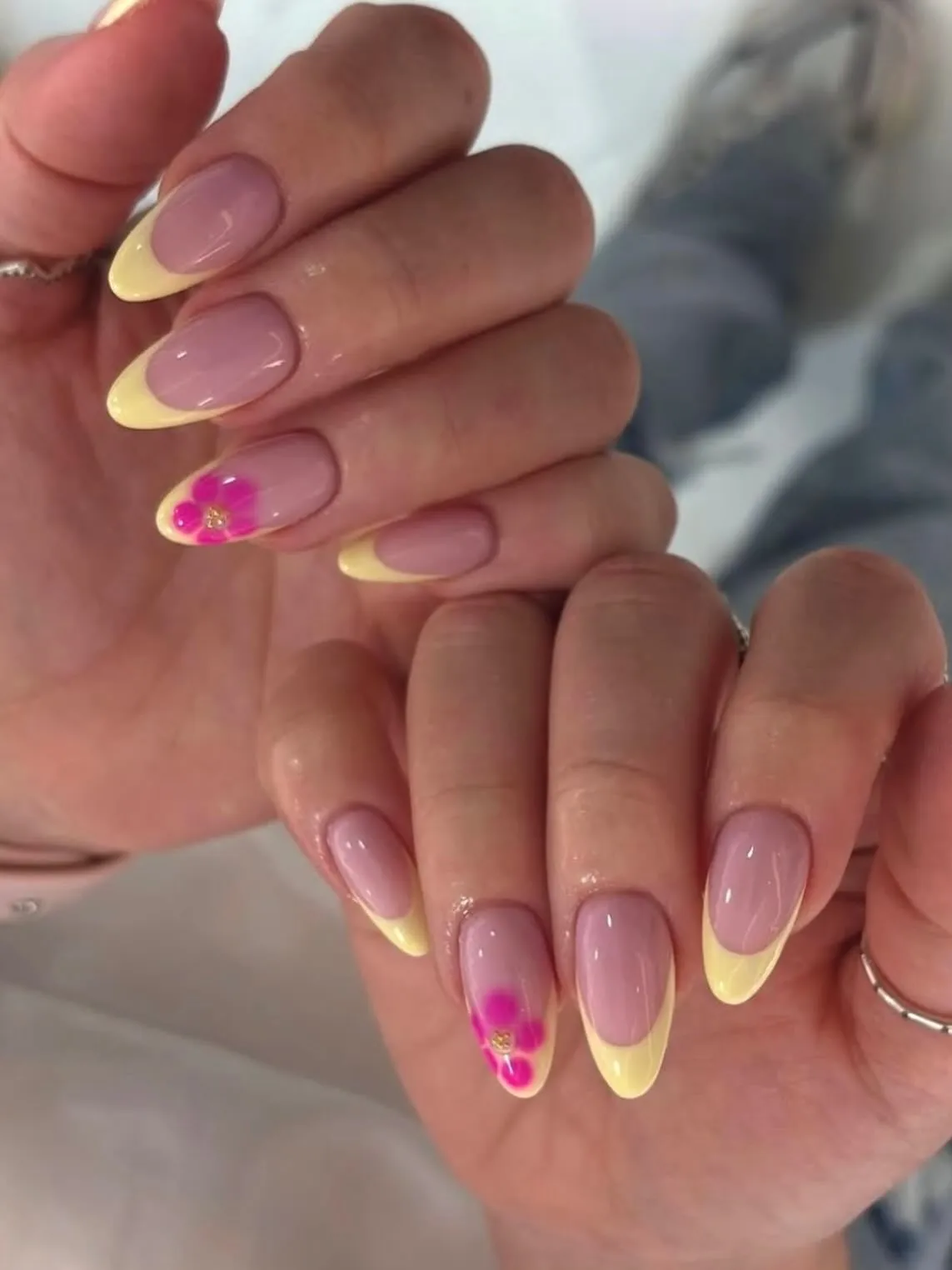 Baby Yellow French Tips with Bright Pink Flower Accent