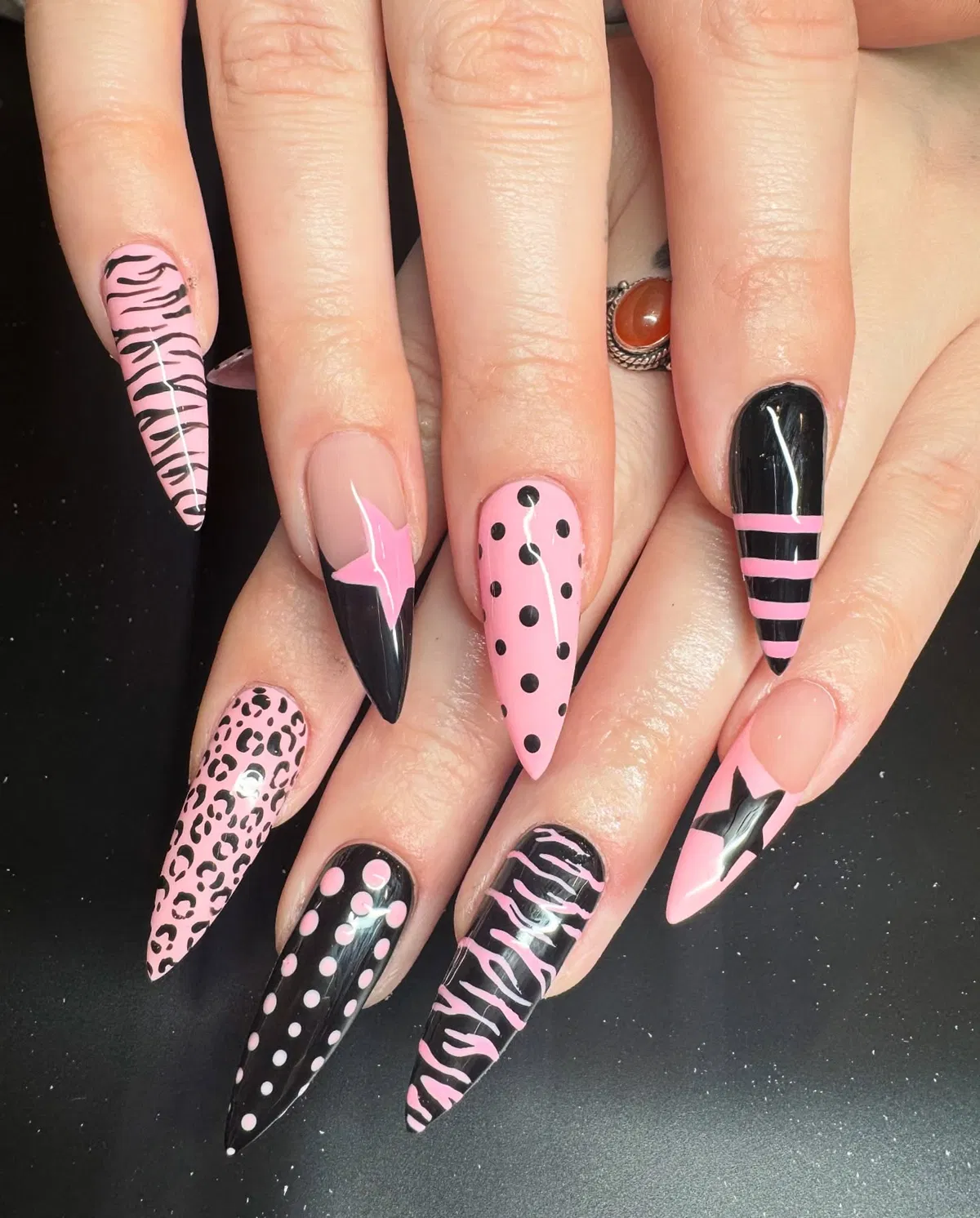 Pink fade with black graphic flames and stripes