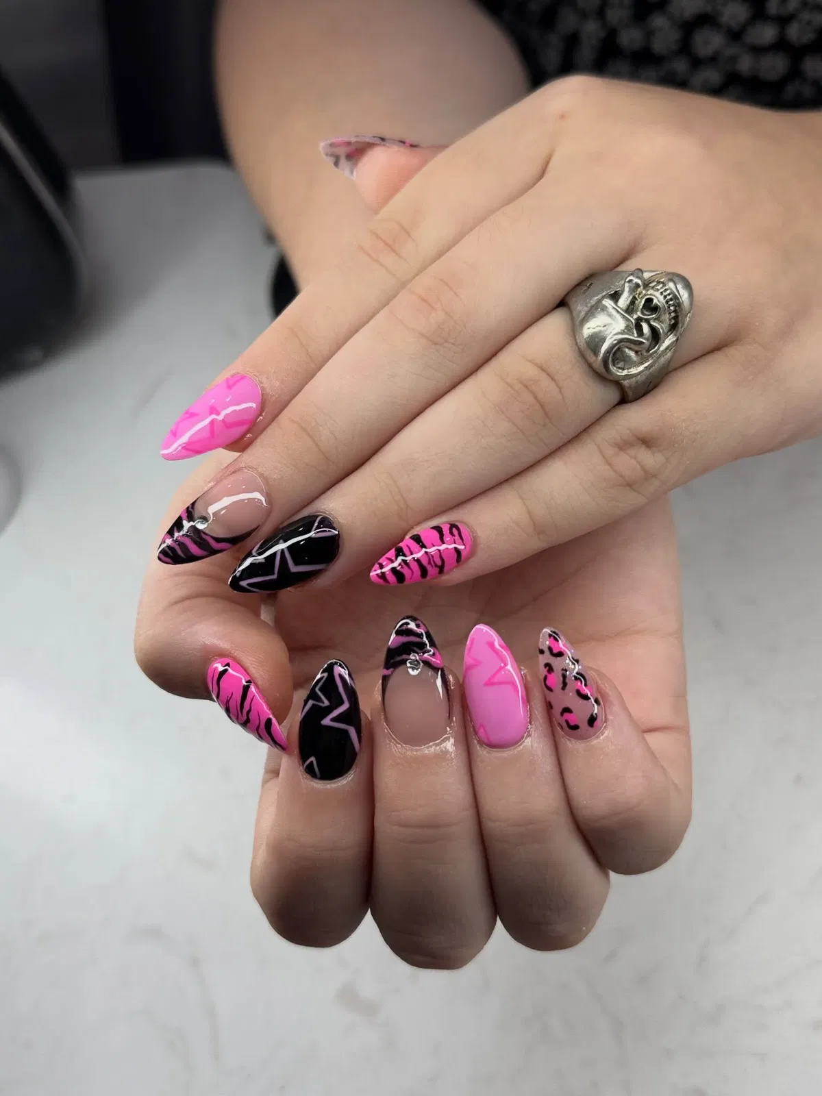 Mixed prints with hot pink and black accents