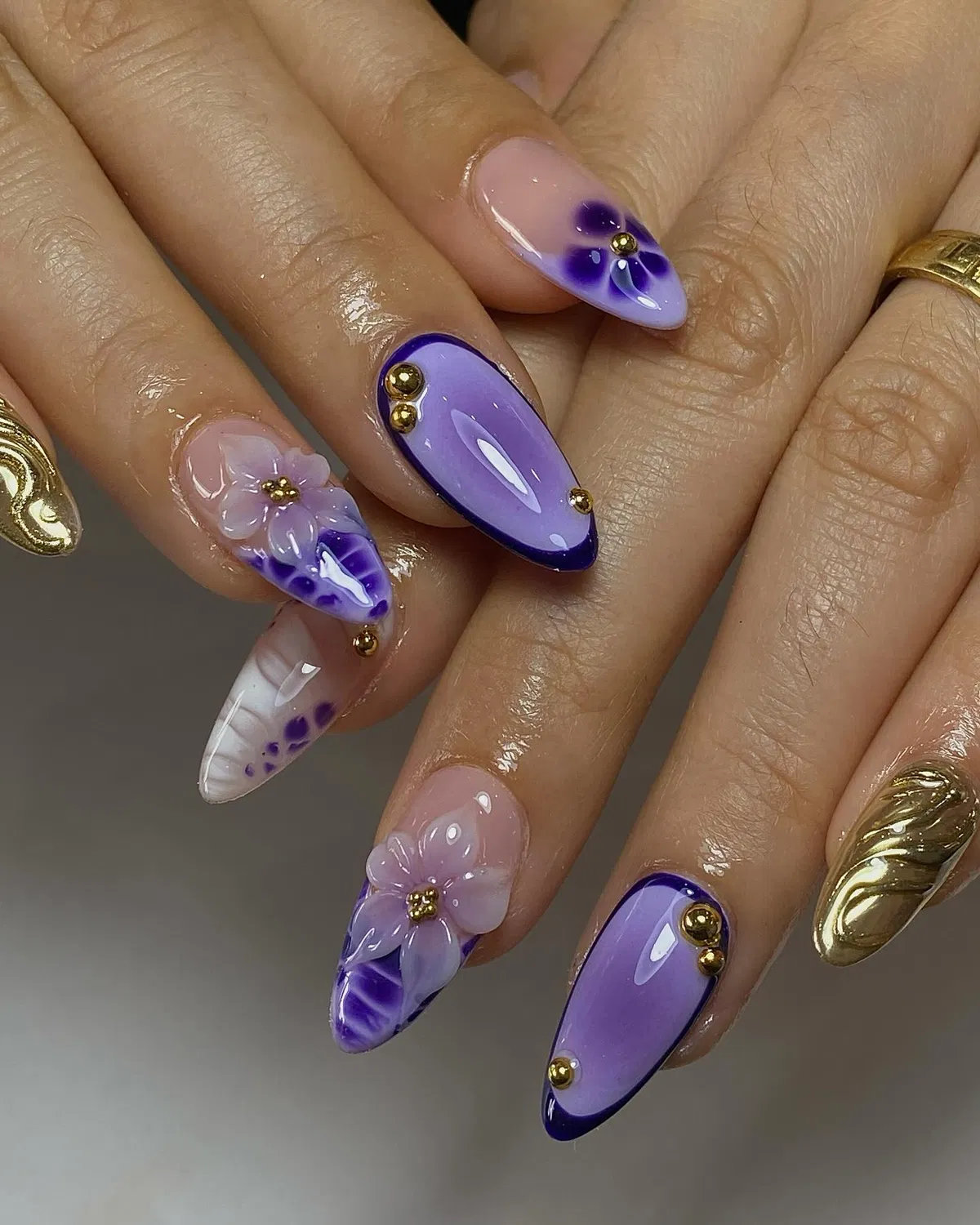Lavender outlines with gold studs and floral accents