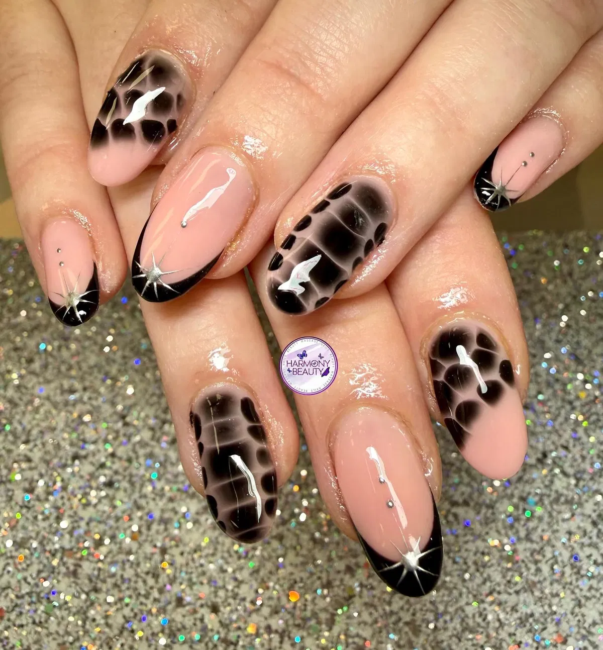 Black French Tips with Silver Starbursts and Smoky Spots