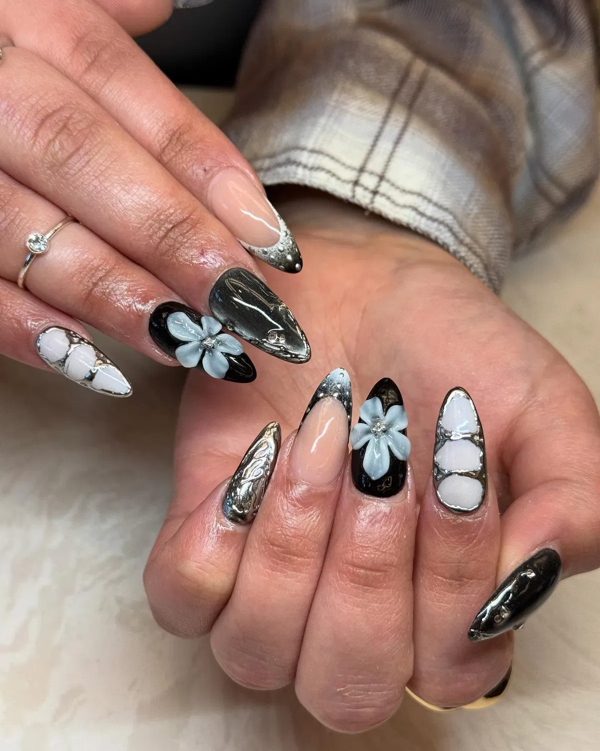 3D Flowers with Silver Accents on Black and Nude