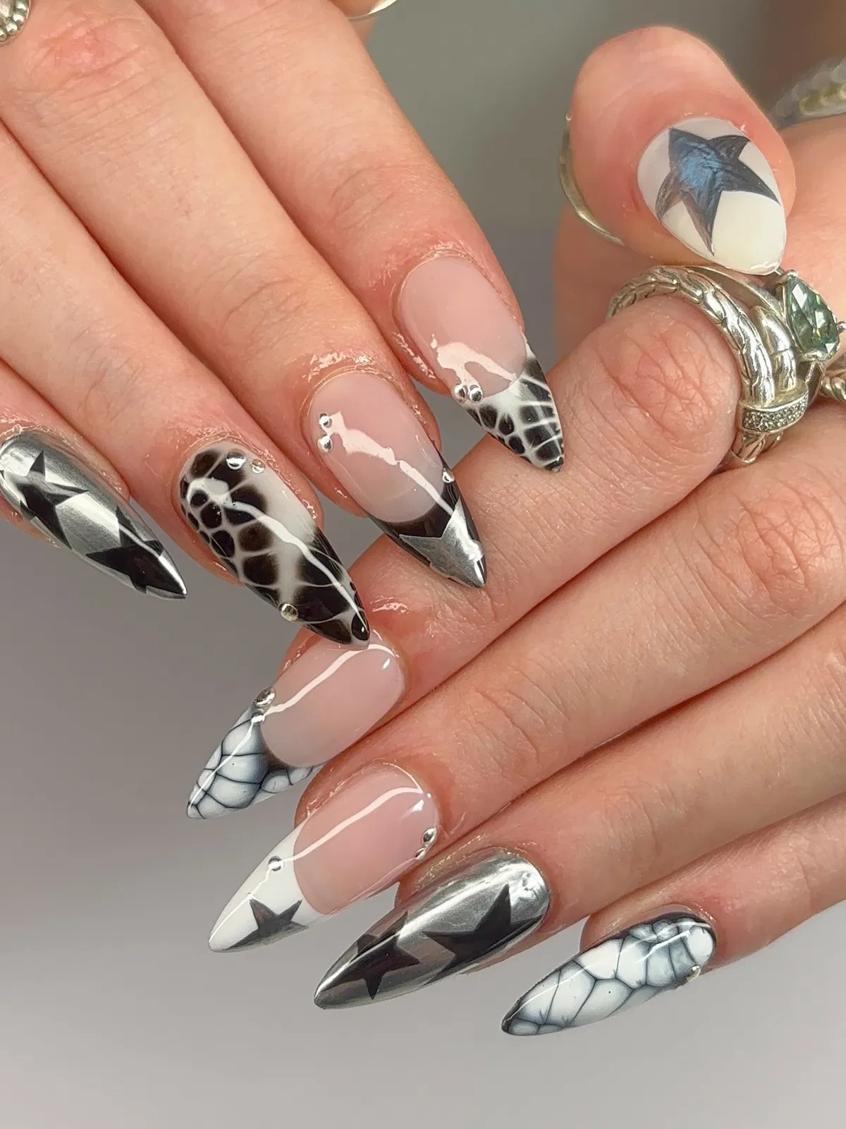 Star Motifs with Silver Tips and Web Accents