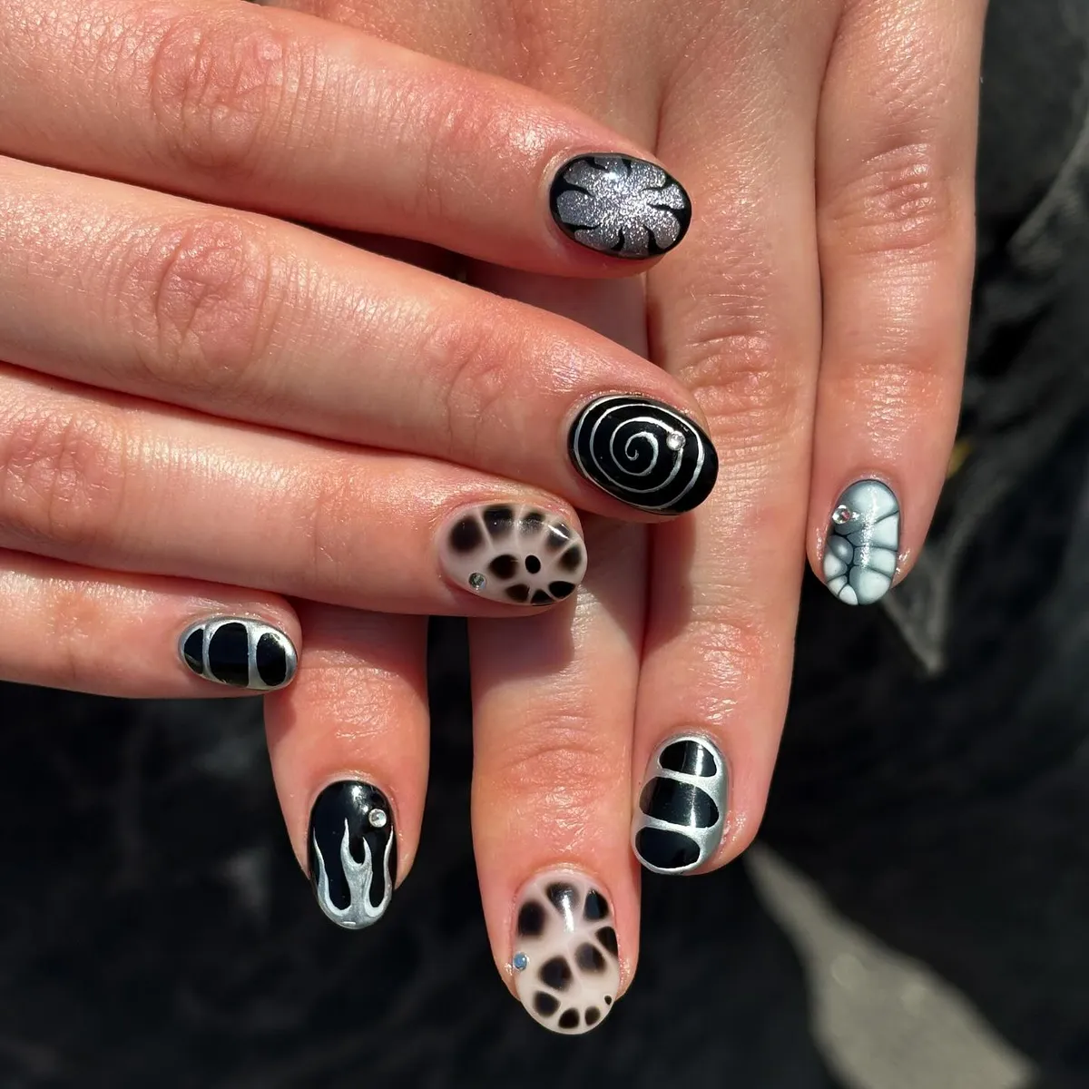 Mixed Motifs: Silver Line Art, Spots, and Web Details