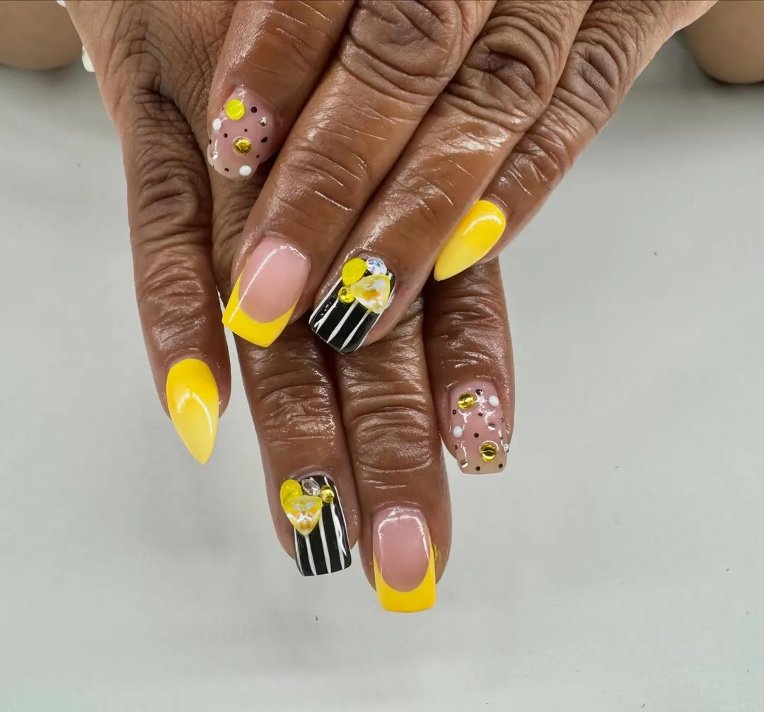 Yellow solids with striped black accent and dotted nude details