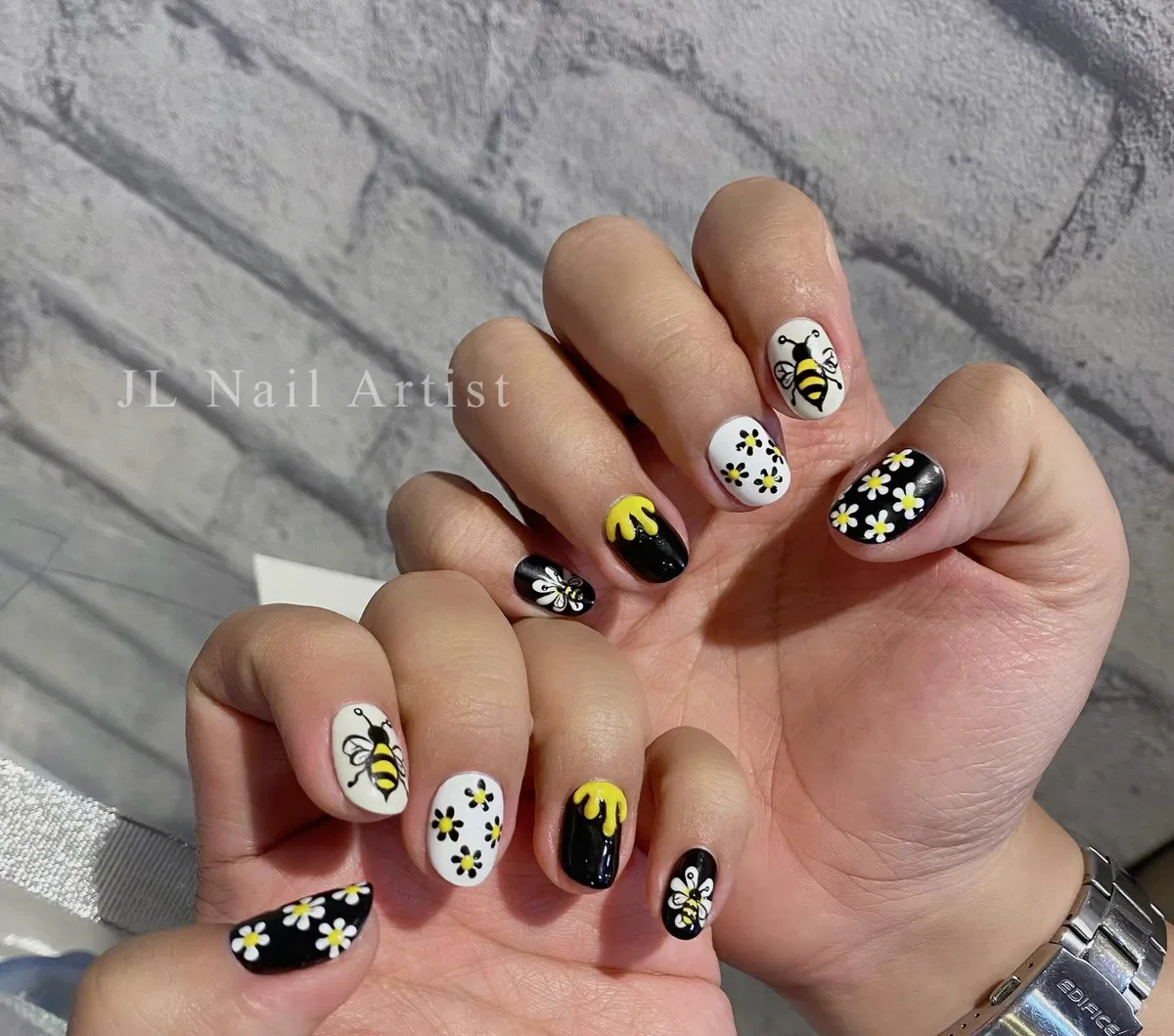 Bee and daisy motifs with black, white, and yellow blocks
