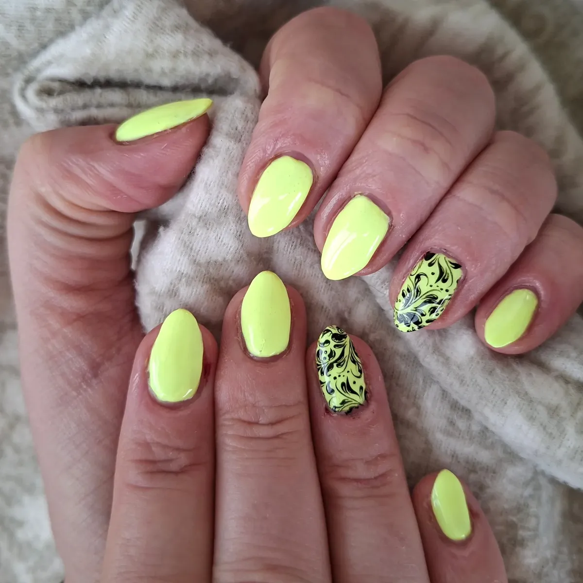 Pale neon yellow with black swirl accents