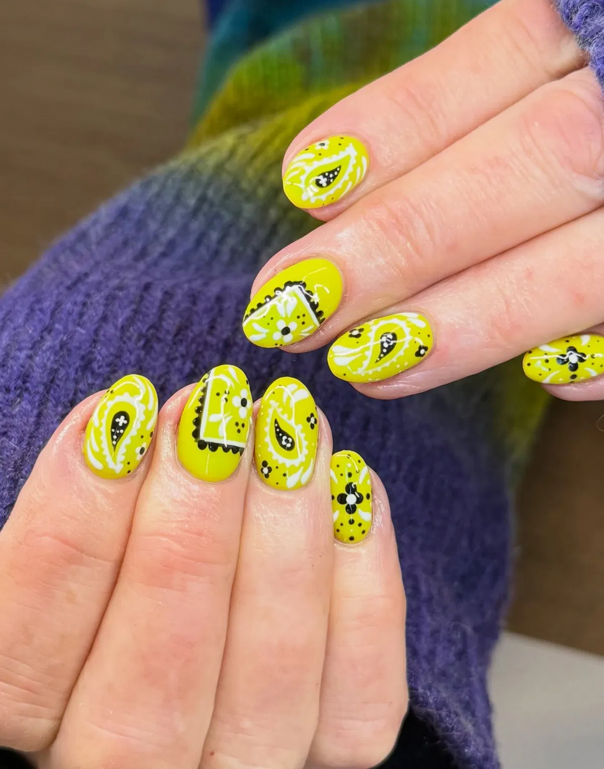 Neon yellow-green base with white-and-black paisley motifs