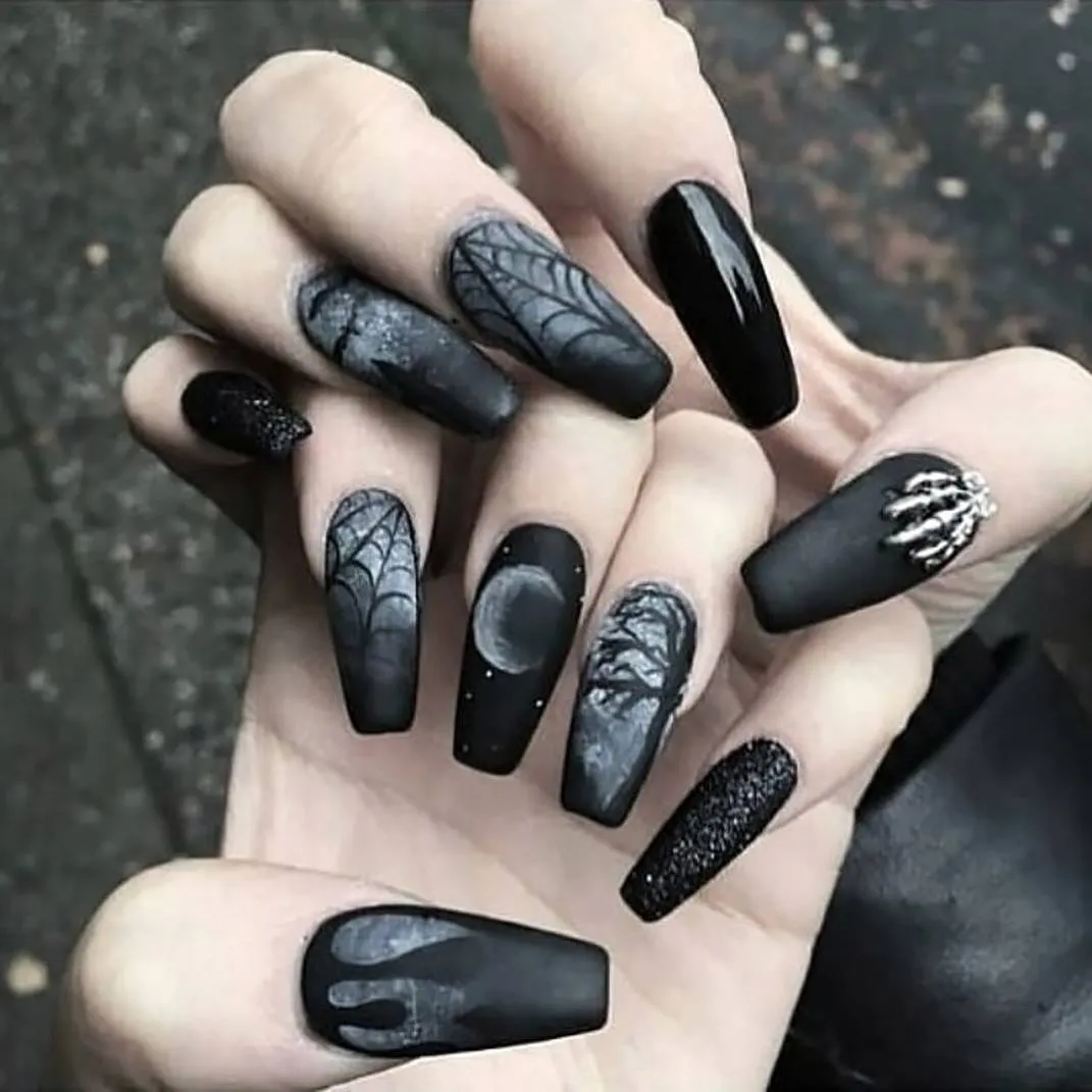 Dark spiderweb set with moon motif and metallic claw charm