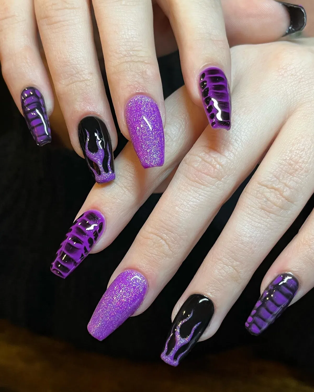 Black and purple glitter flames with animal-print accents