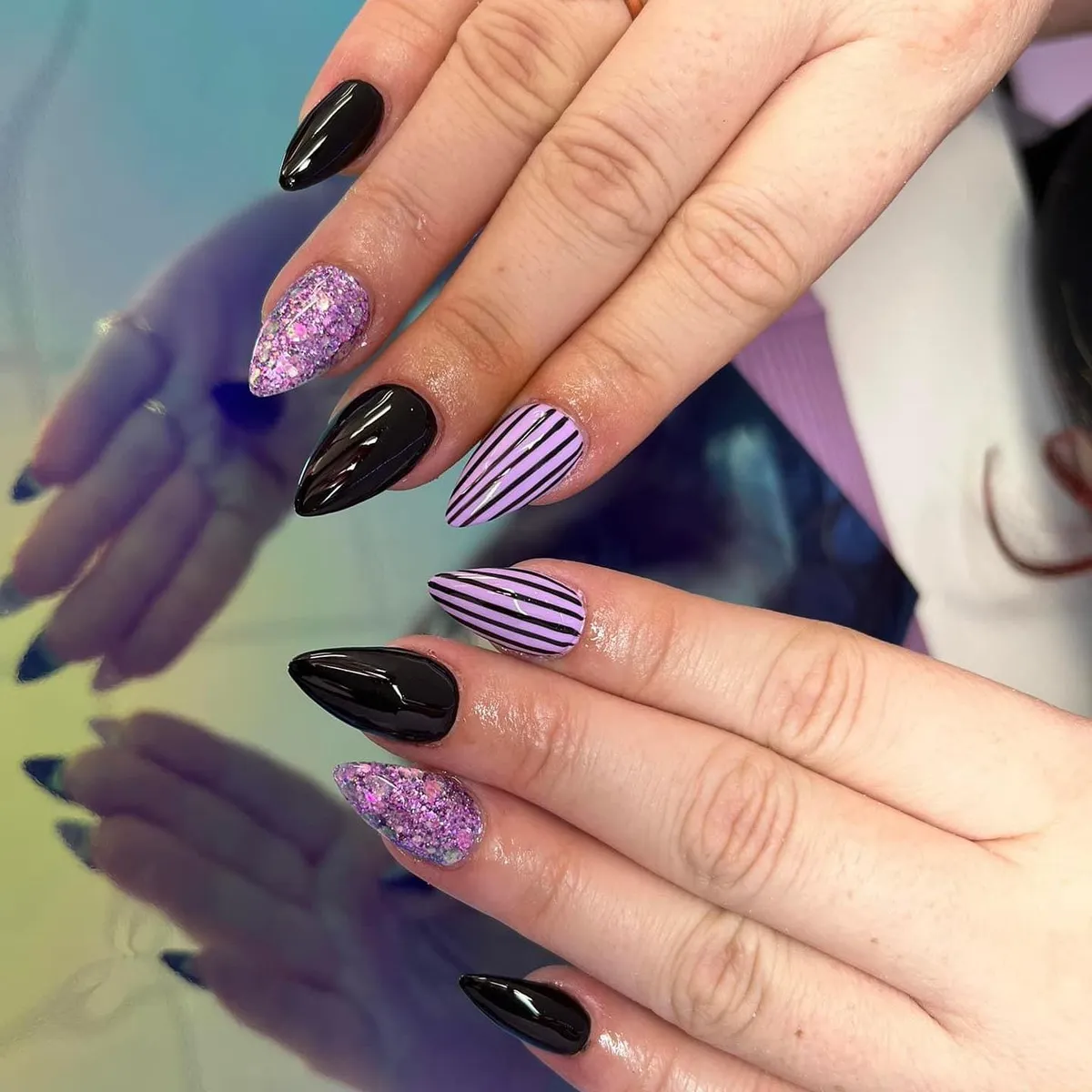 Black solids with lavender stripes and purple glitter accents