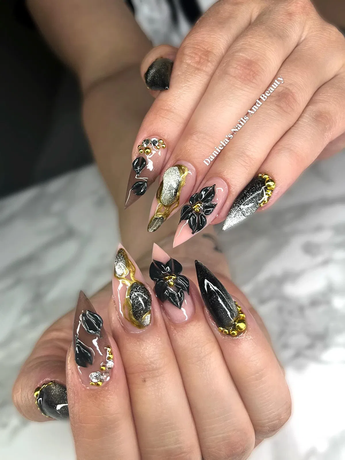 Black floral 3D accents with gold and silver metallic details