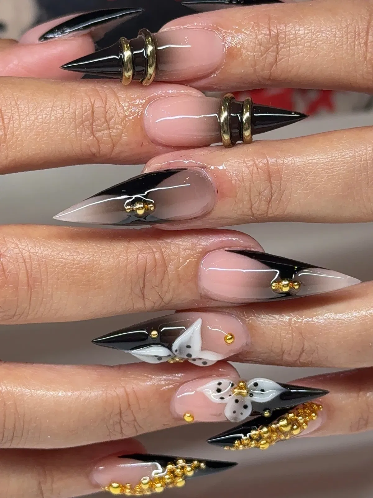 Nude Base with Black Tips and Gold Accents