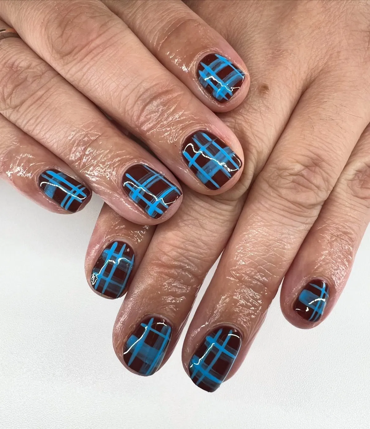 Bright Blue Plaid Lines on Dark Brown Base