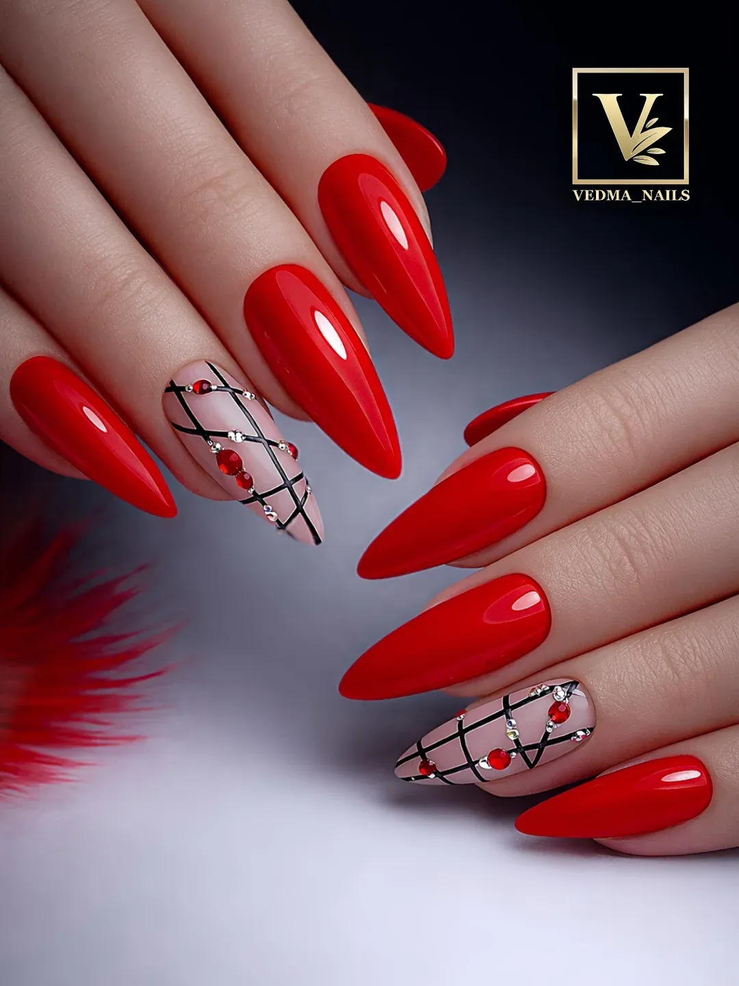 Bright red stilettos with black grid and red gem accents