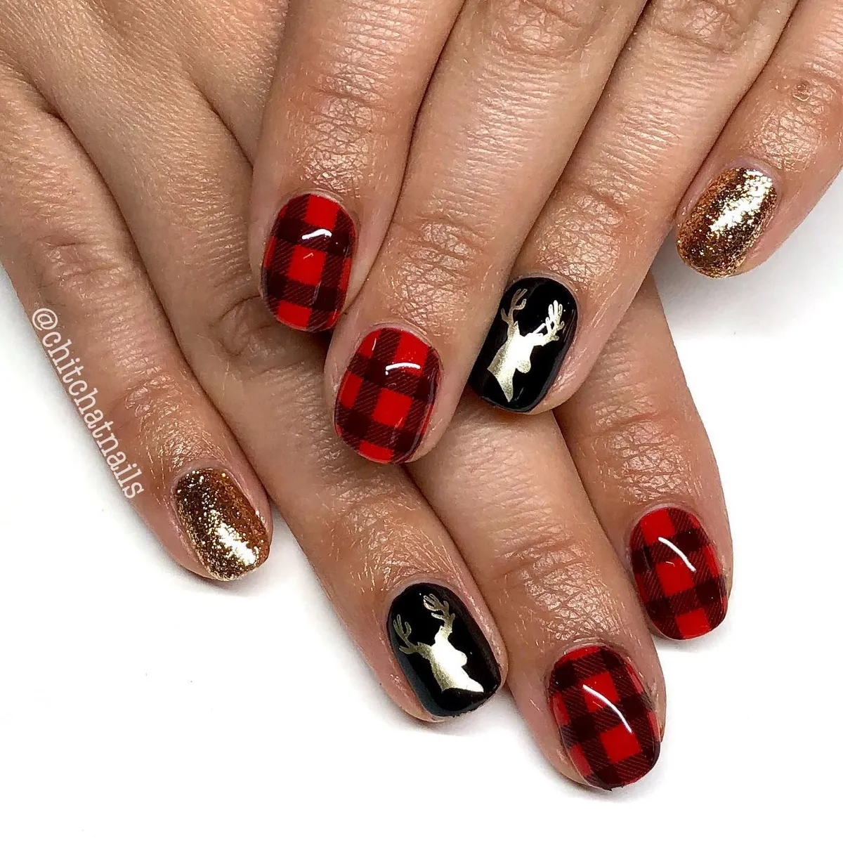 Red-and-black checkered with gold deer silhouettes