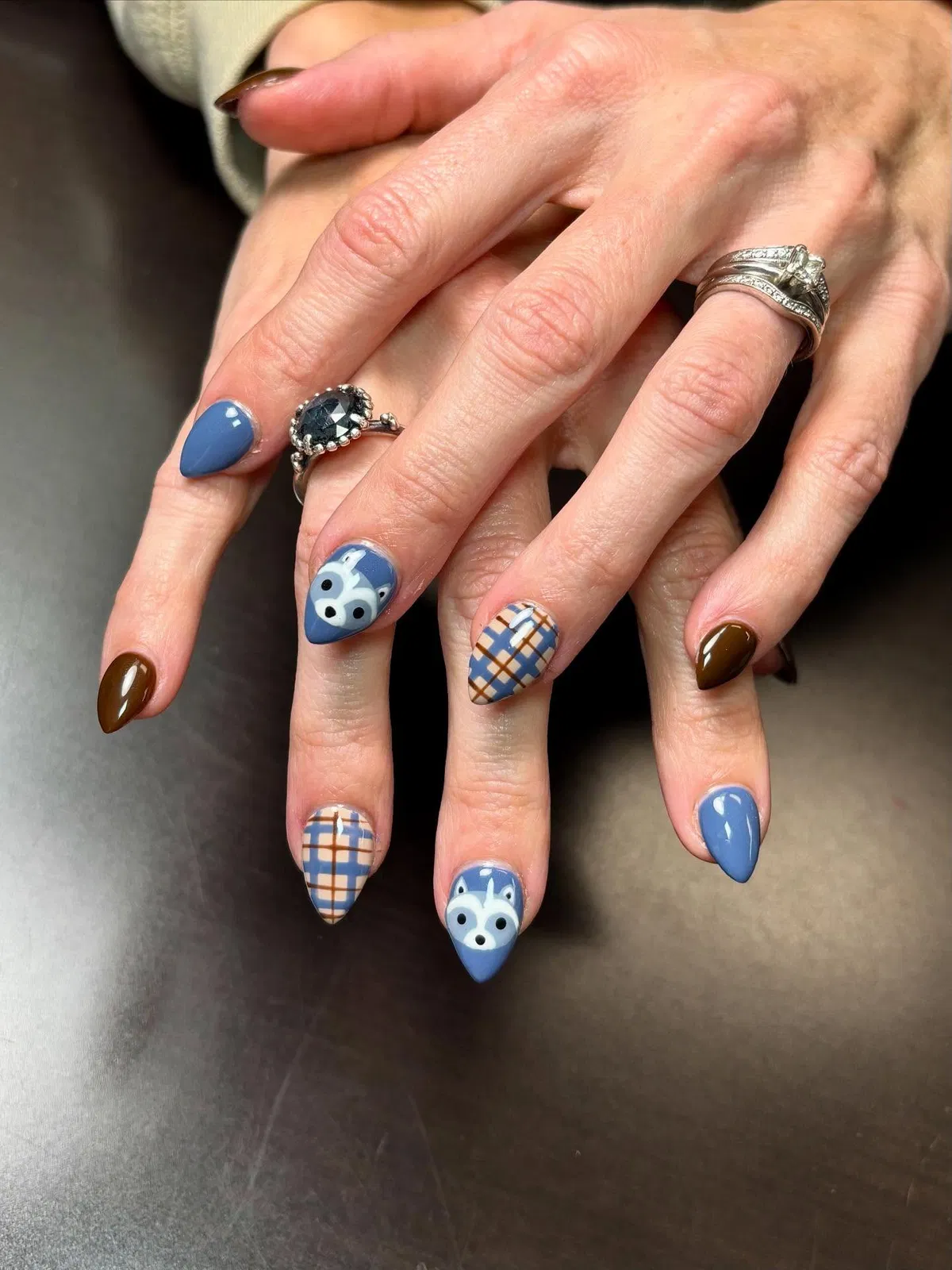 Blue-and-brown plaid with animal-face accents