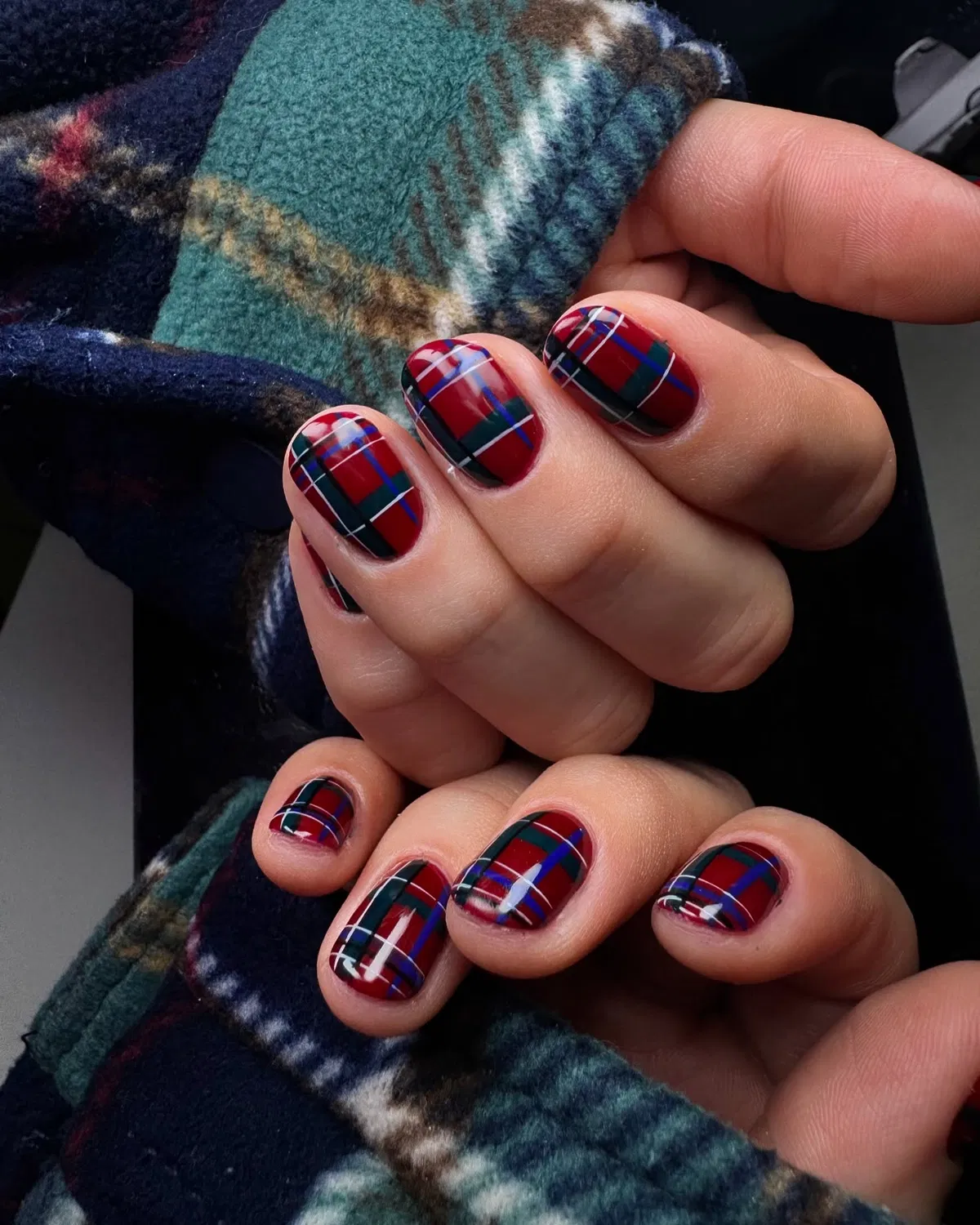 Full-coverage tartan plaid in red, green, navy, and white