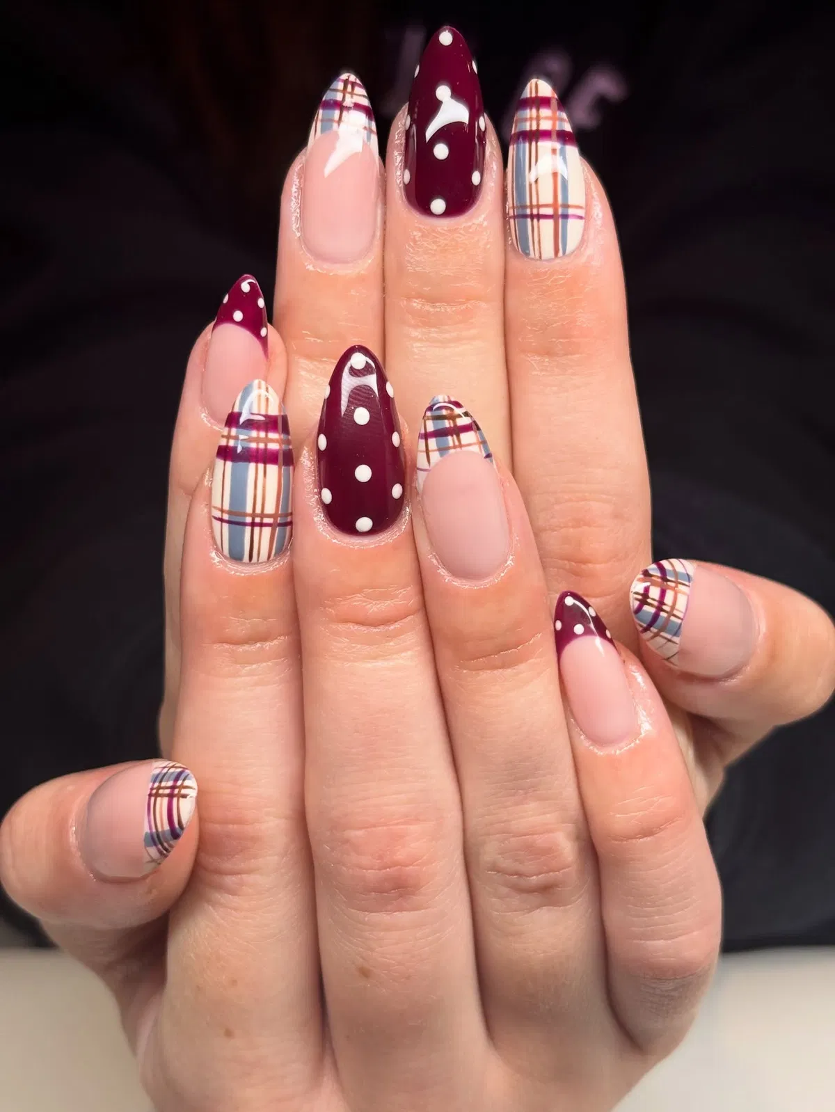 Plaid French tips with burgundy polka-dot accent nails