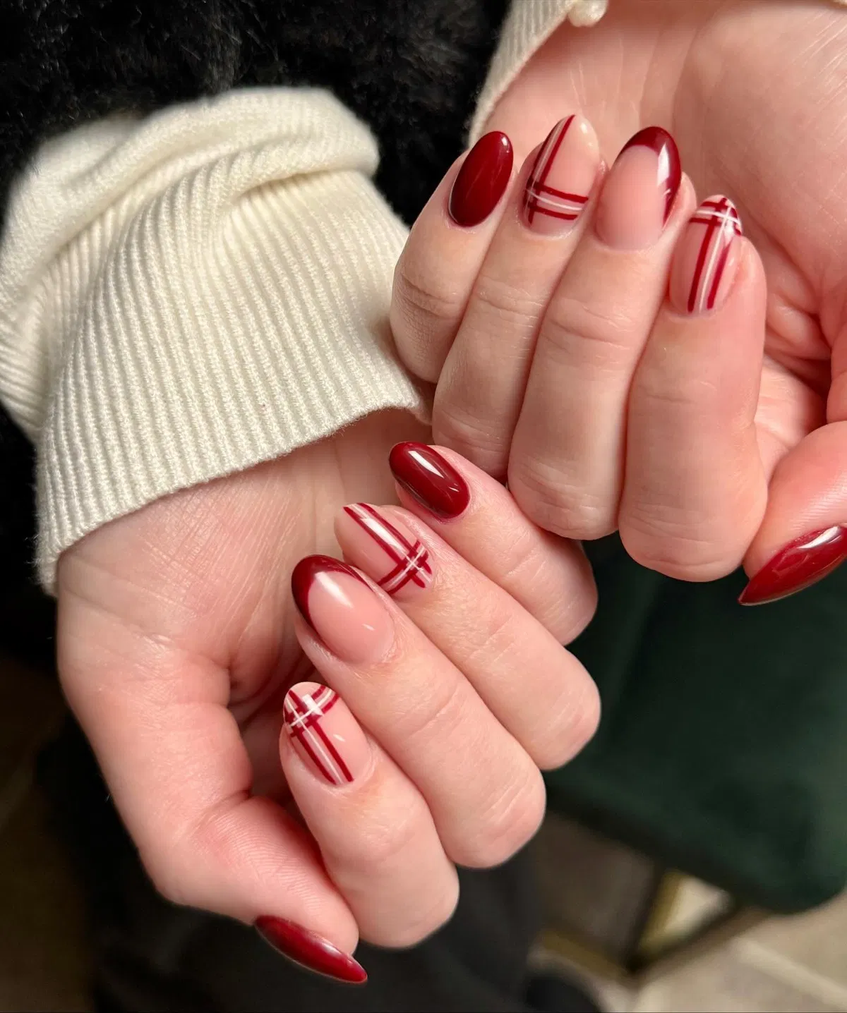 Deep red French tips with thin plaid line accents