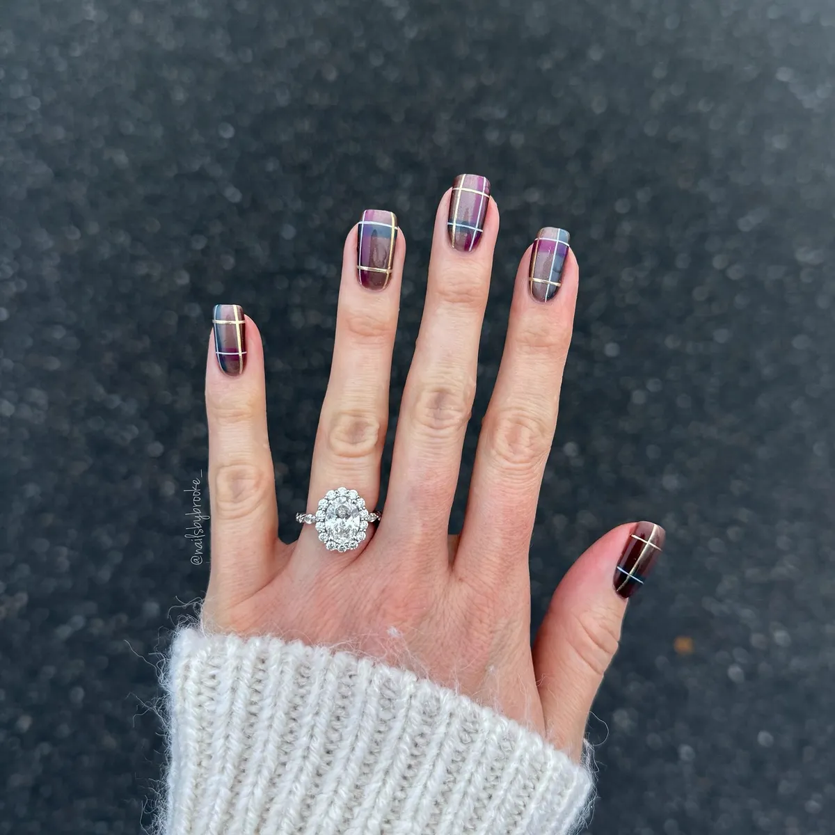 Dark purple-gray plaid with light blue and gold grid lines