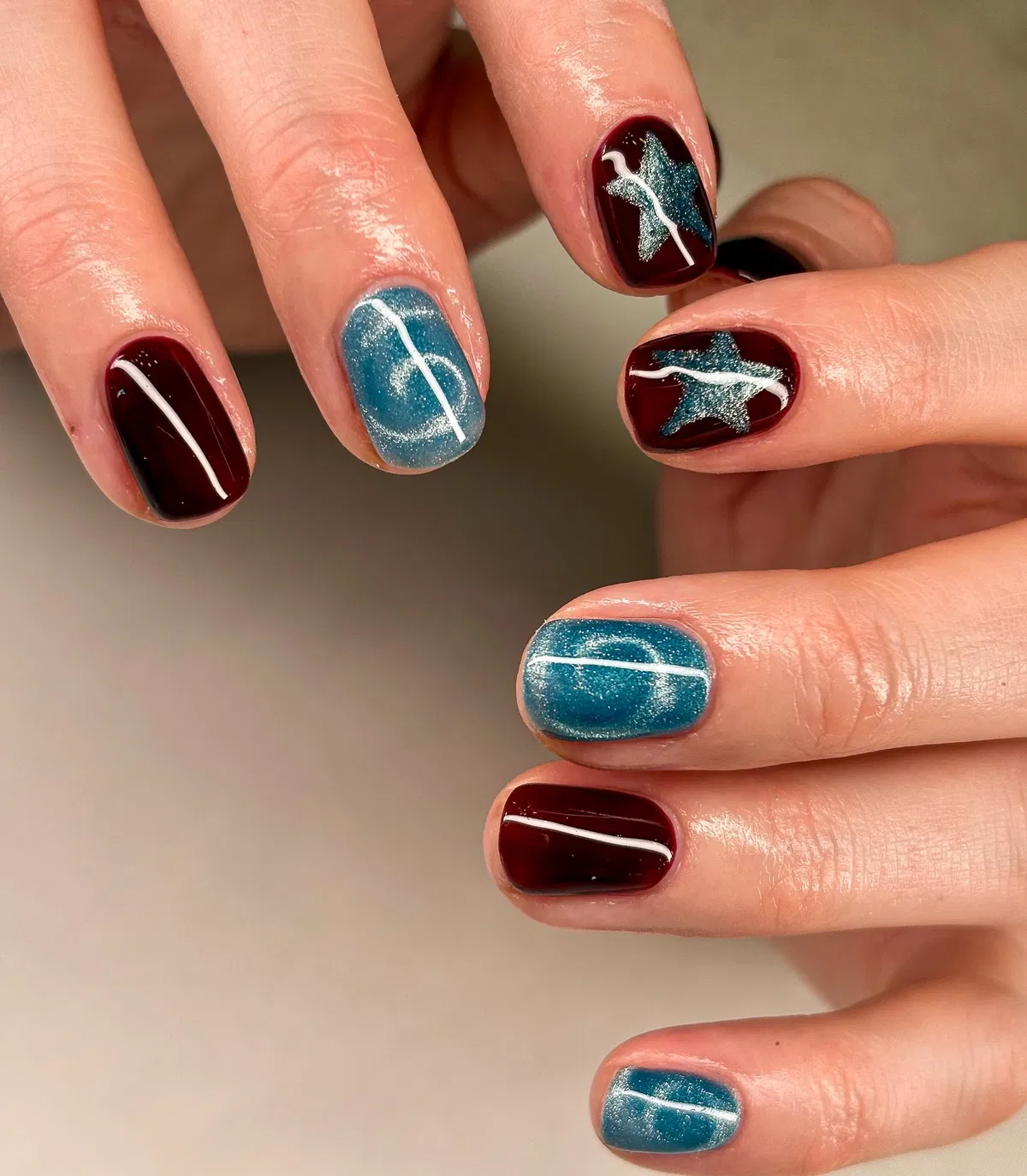 Burgundy and teal with stars and white striping