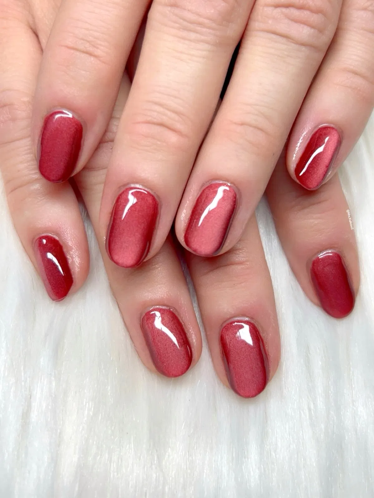 Glossy Red Nails with Soft Central Highlight
