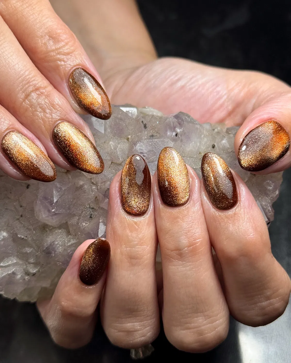 Bronze-copper shimmer with strong reflective highlights