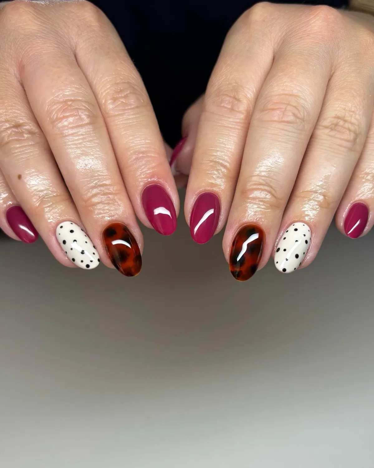 Magenta, polka dots, and tortoiseshell-style accents