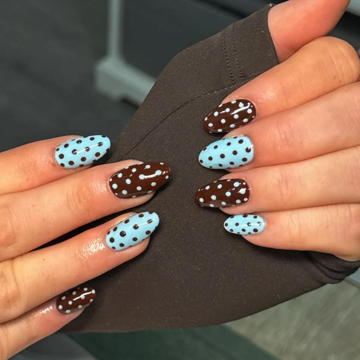 Two-tone polka dots in light blue and dark brown