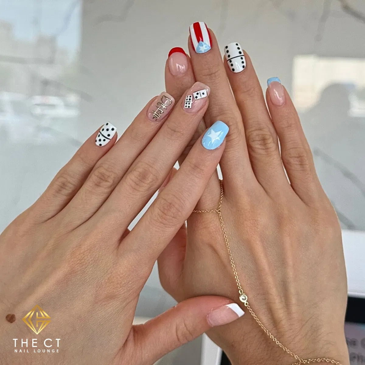 Domino dots, star accent, and colorful French tips