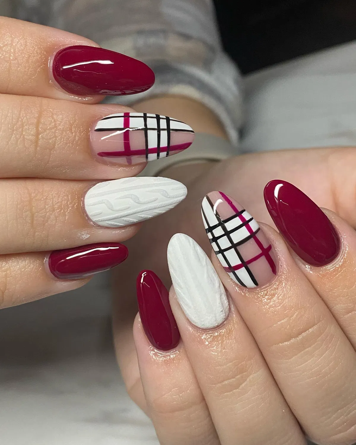 Burgundy solids with magenta-black plaid and white textured accents