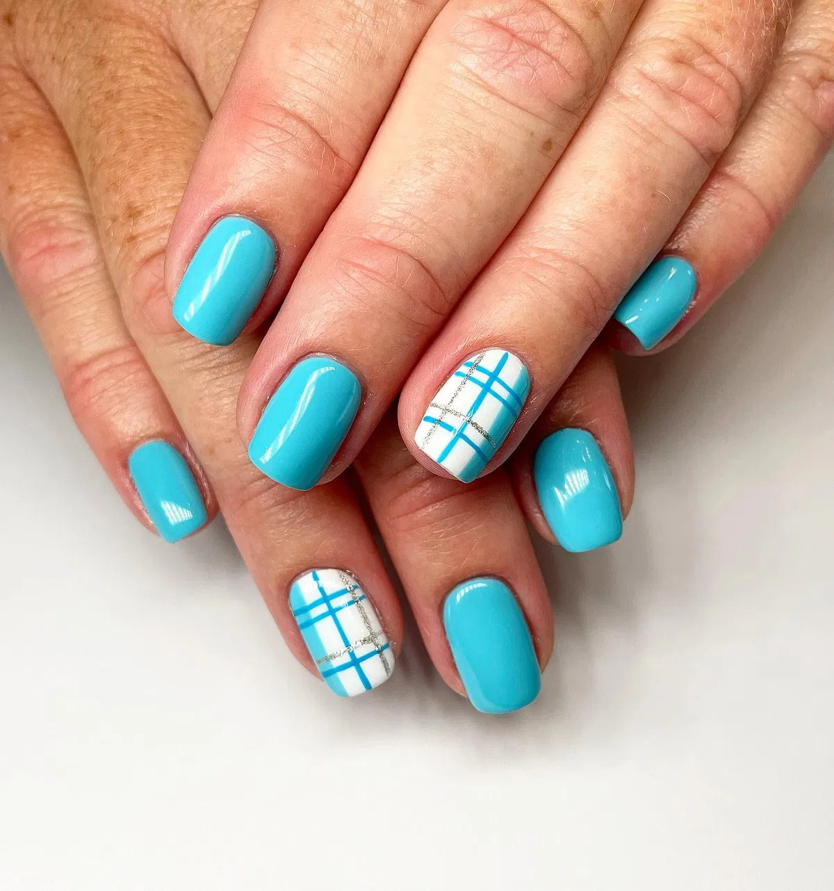 Turquoise solids with white-and-turquoise plaid accents