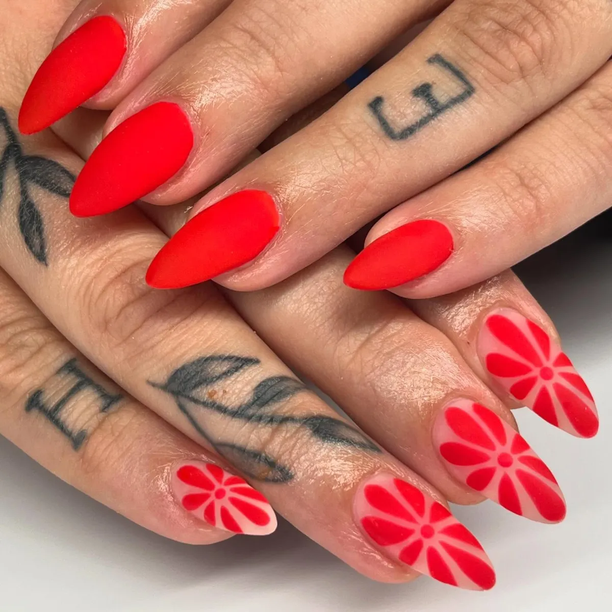 Matte red with bold floral-petal accents