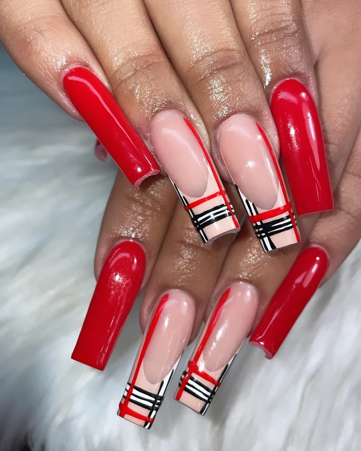 Red coffin nails with nude-and-linework tip accents