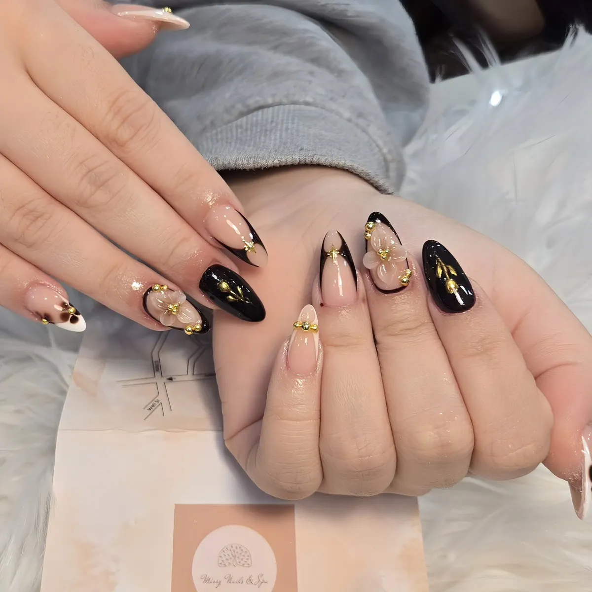 Black-and-nude with 3D flowers and gold bead accents