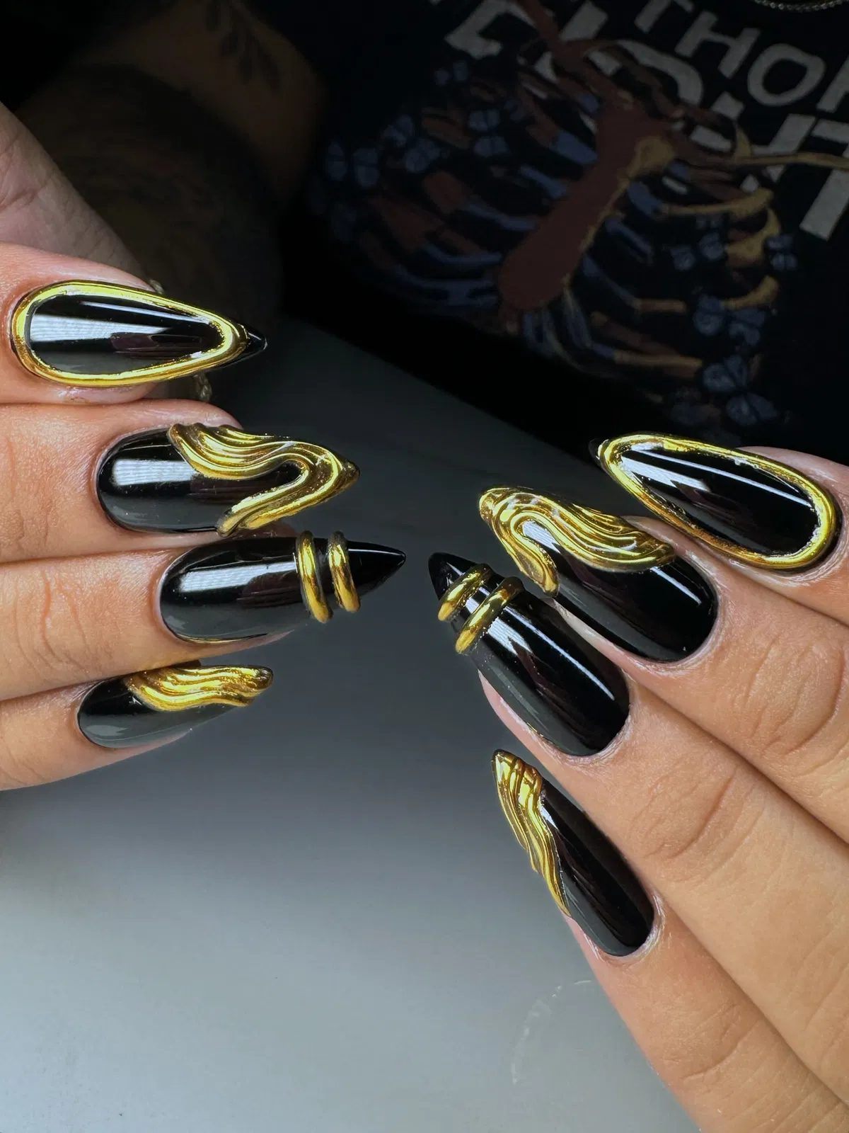 Glossy Black with Bold Gold Contour Lines