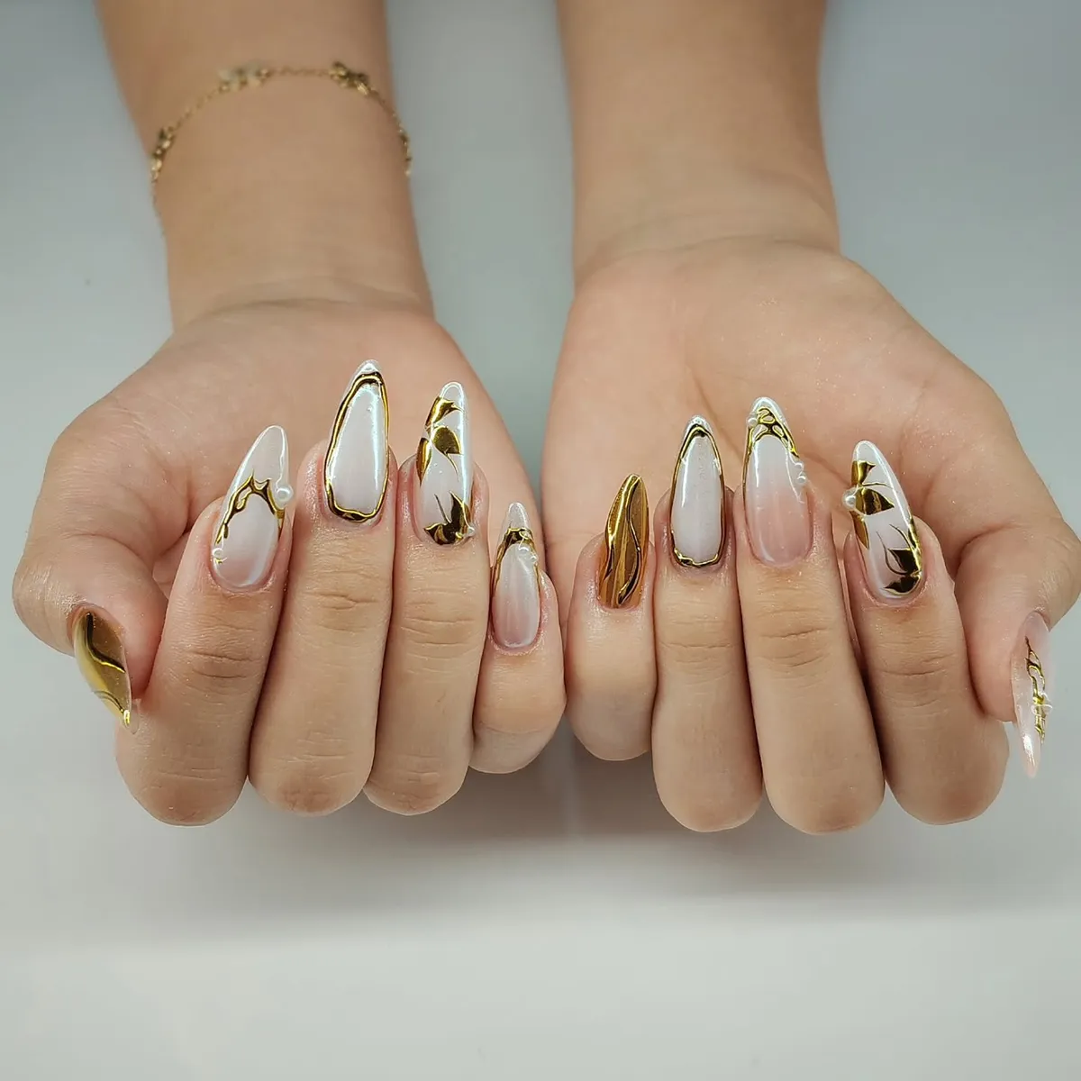 Gold-bordered white panels with metallic gold accents