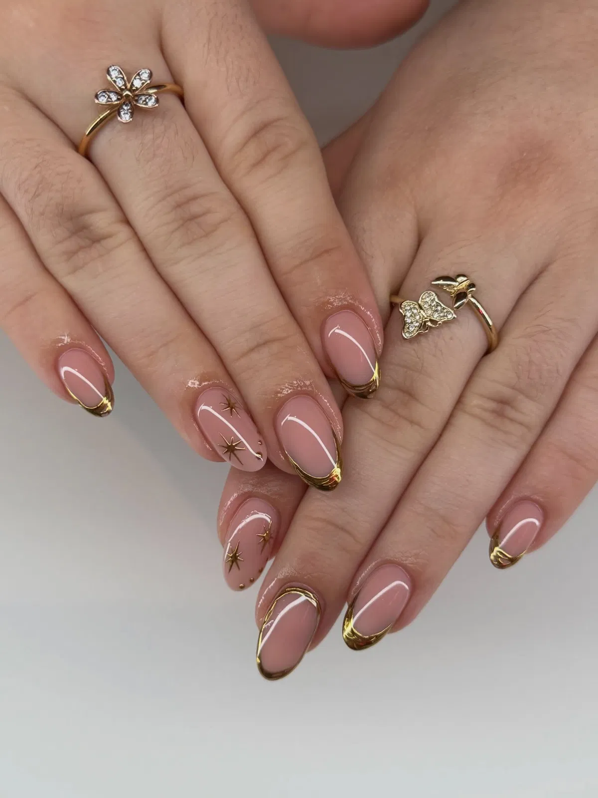 Minimal Gold Outline French with Tiny Stars