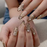 💛 18 Elegant Gold Cat Eye Nails for a Radiant Statement Manicure Fashion image by @isbeaute.official