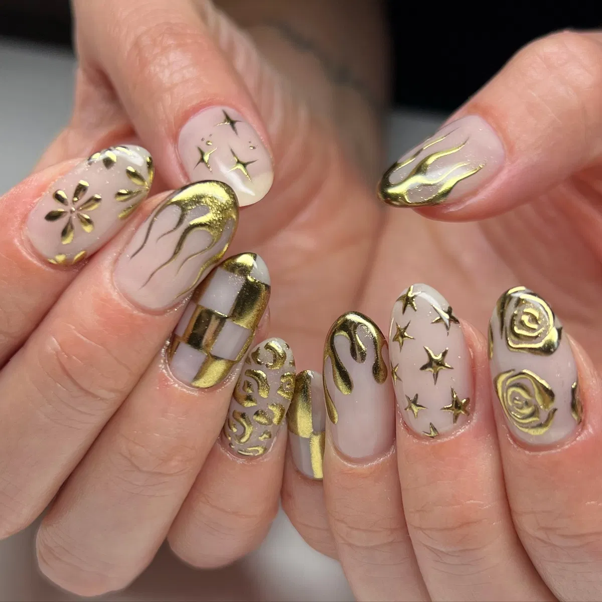 Gold Motif Mix: Stars, Flames, Checkerboard, and Rose Outlines