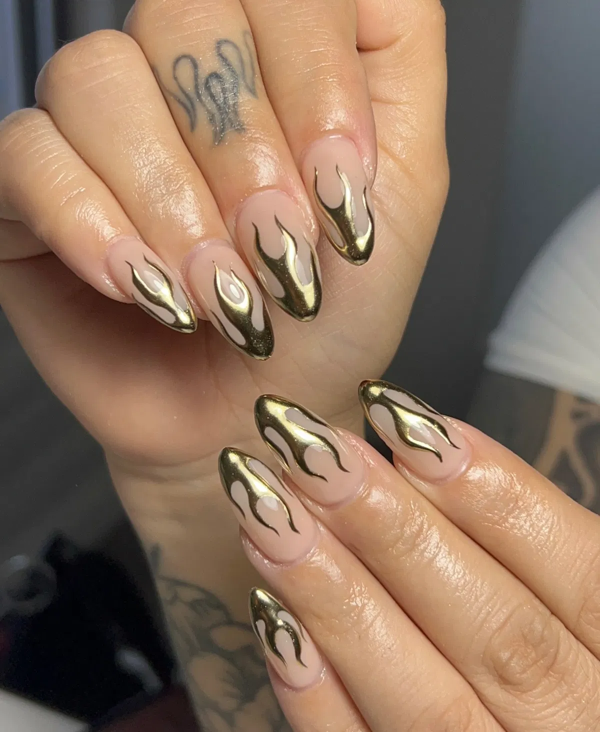 Nude Almond Nails with Gold Chrome Tips