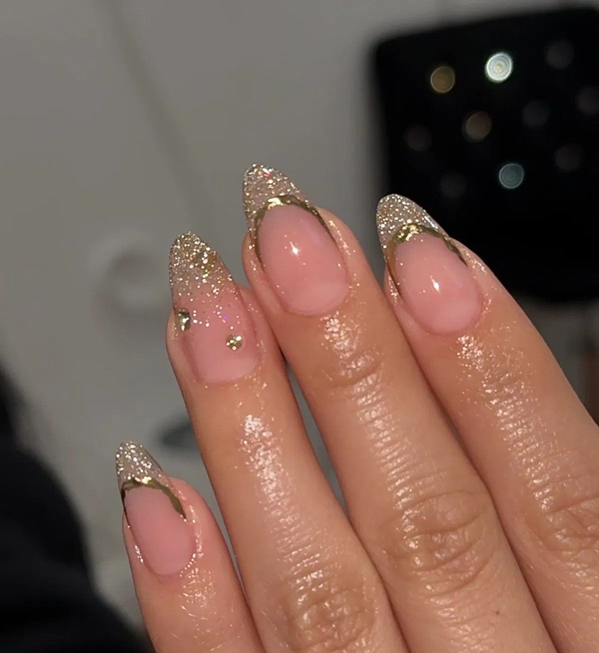 Glitter gold French tips with thin gold outline