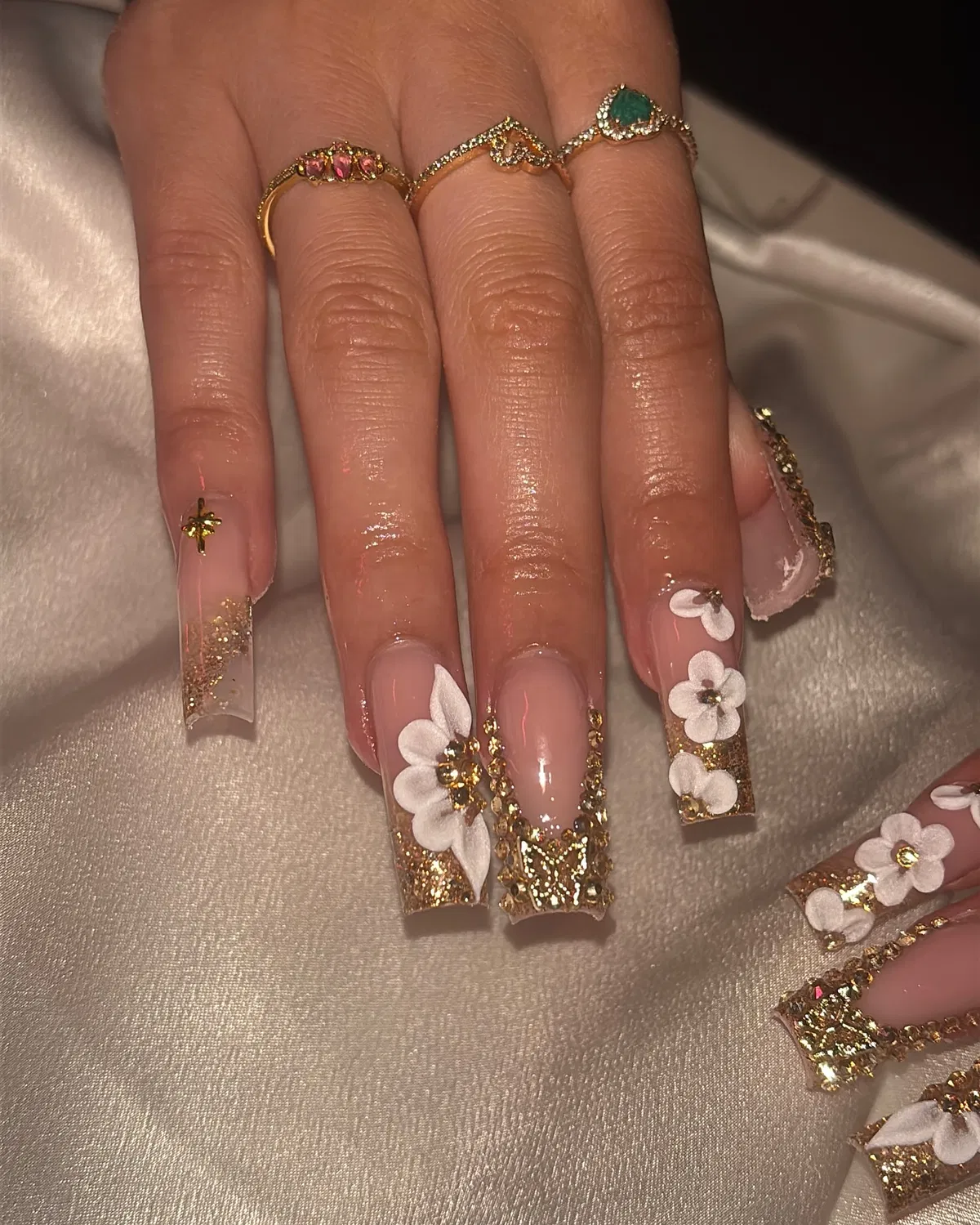 Gold glitter and white 3D florals with chain accents