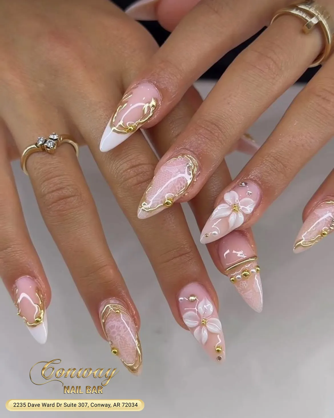 Gold outlines with white tips and 3D floral accents