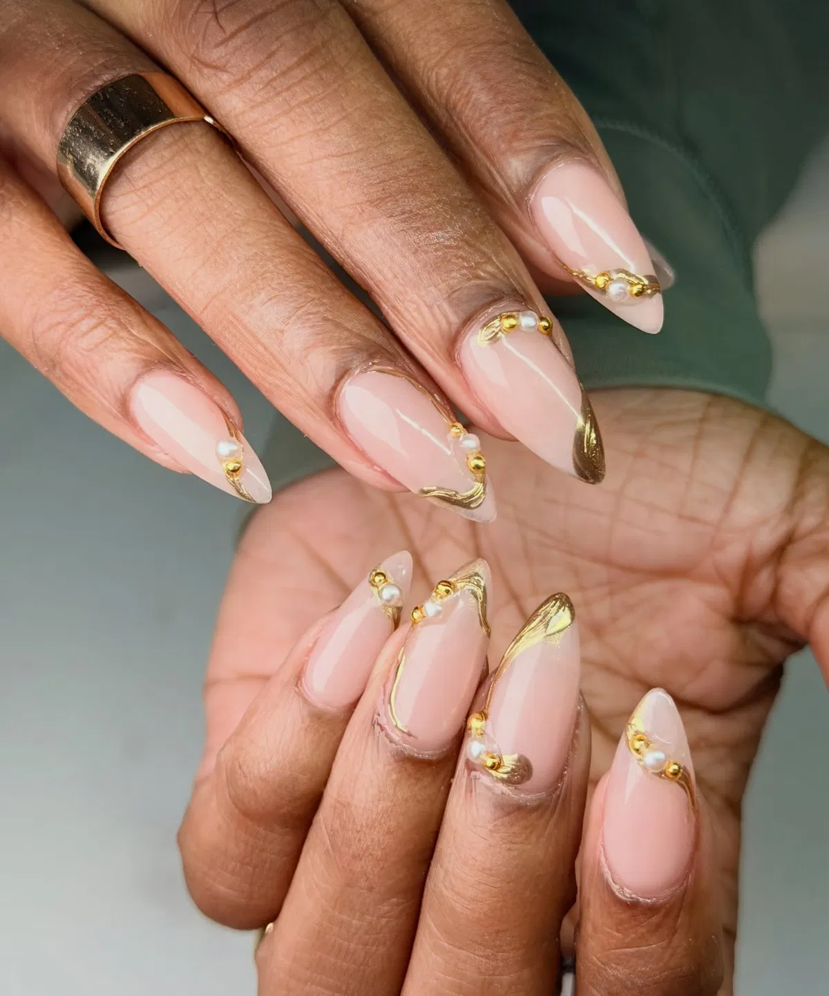 Minimal gold corner tips with pearl-and-gold bead clusters
