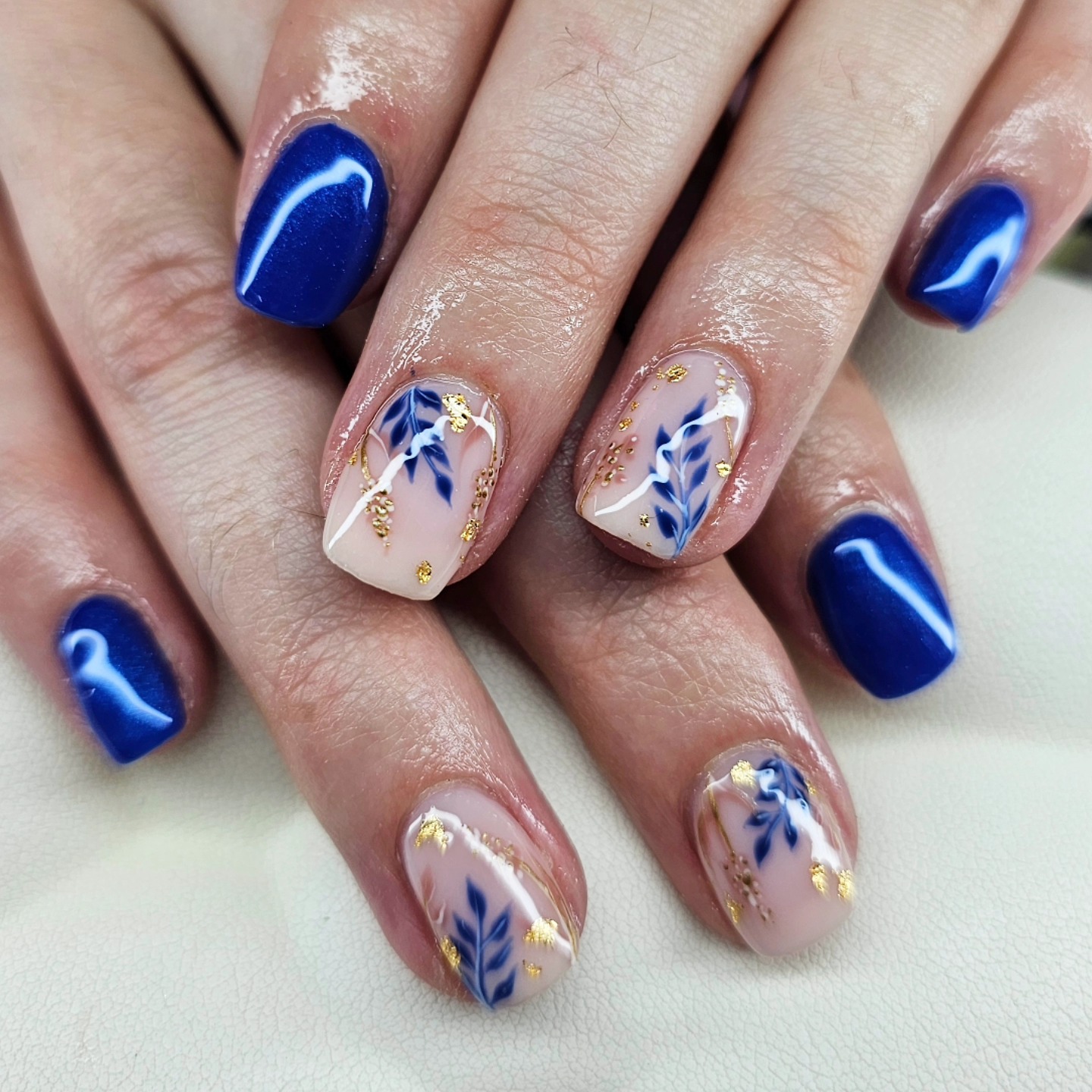 Royal blue solids with blue leaf art and gold flecks