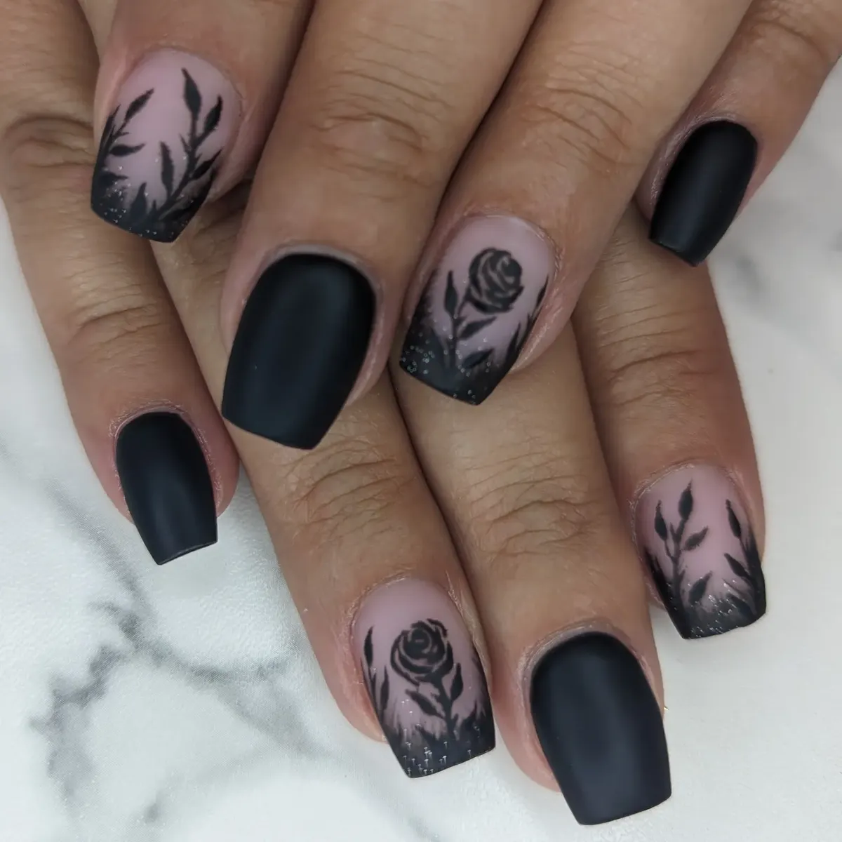 Matte black solids with botanical silhouette accents